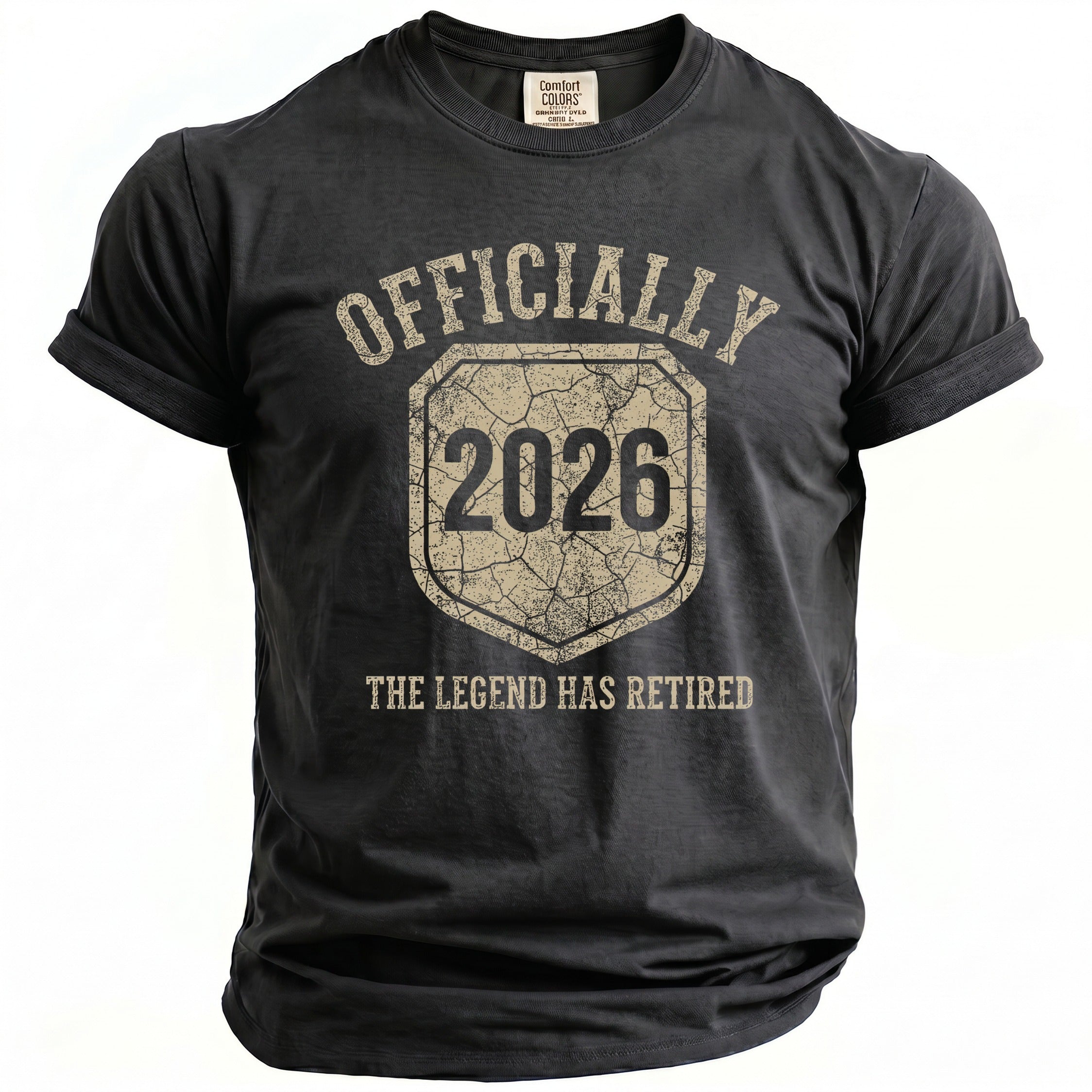 Dark gray t-shirt with distressed text "OFFICIALLY 2026 THE LEGEND HAS RETIRED."