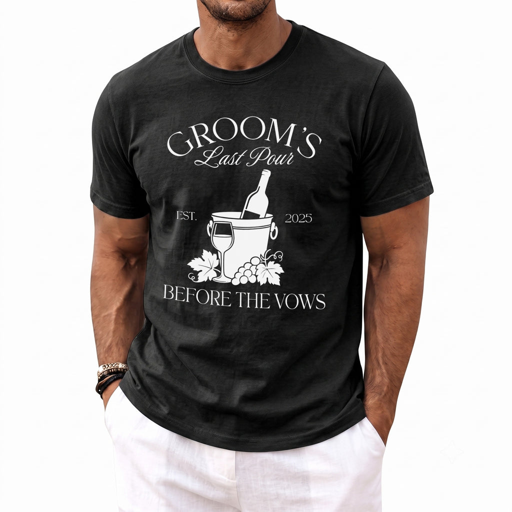 Black t-shirt with white text "Groom's Last Pour" and wine imagery.