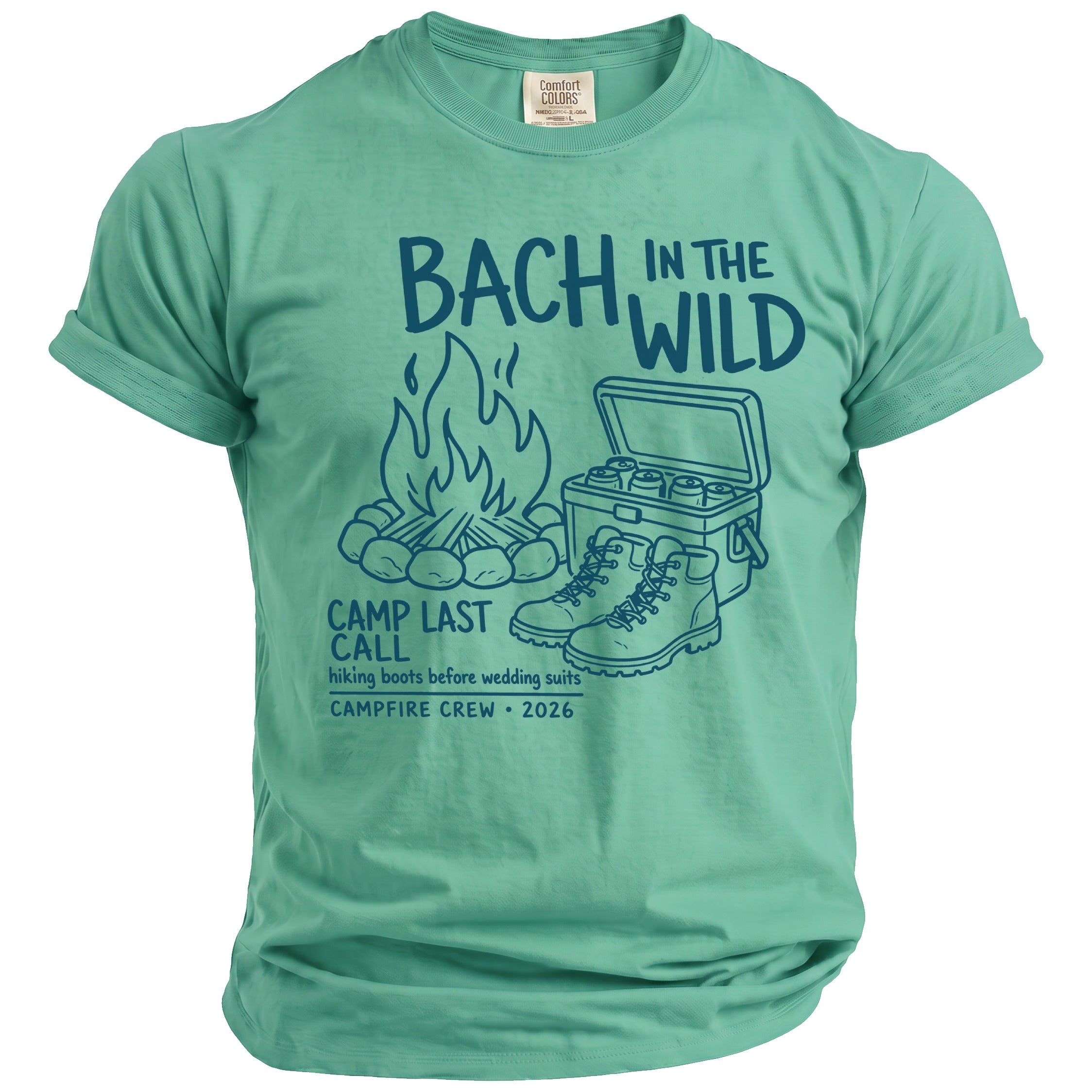 Green t-shirt with "Bach in the Wild" graphic, campfire, cooler, and boots.