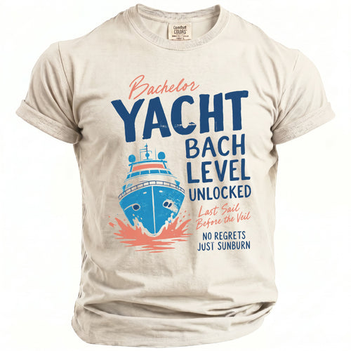 Light beige t-shirt with "Bachelor Yacht Bach Level Unlocked" and boat graphic.