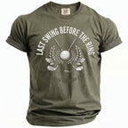 Olive green t-shirt with "LAST SWING BEFORE THE RING" and golf graphics.