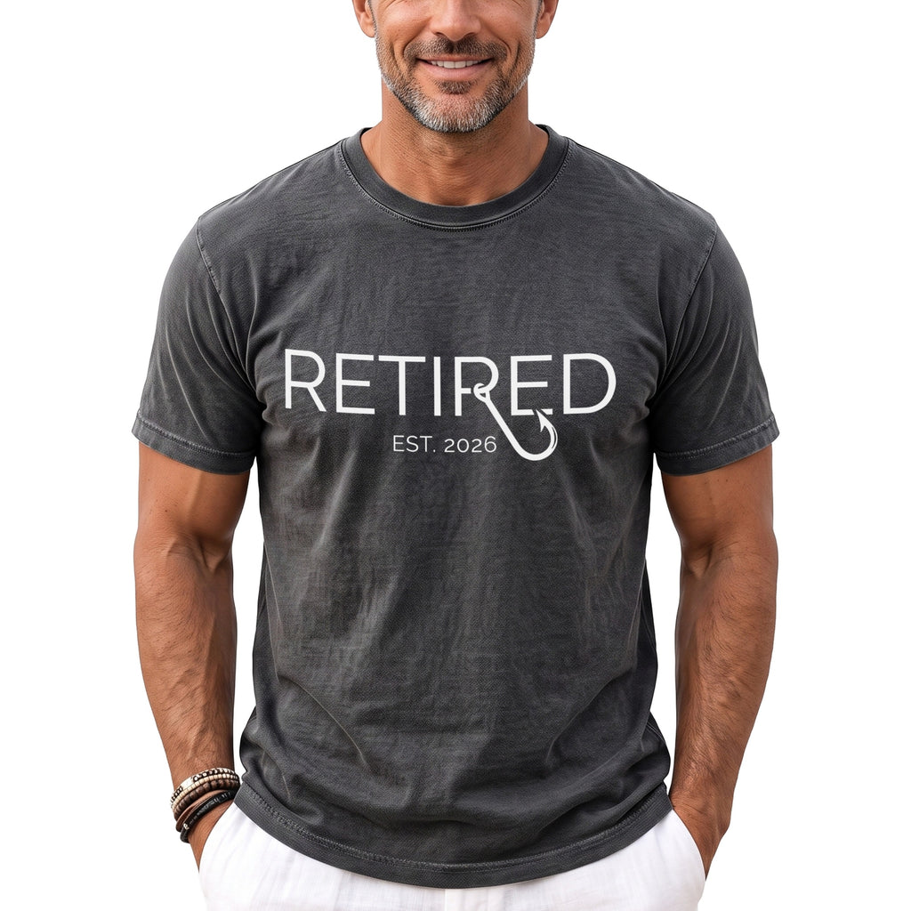 Grey t-shirt with "RETIRED EST. 2026" text and fishing hook graphic.