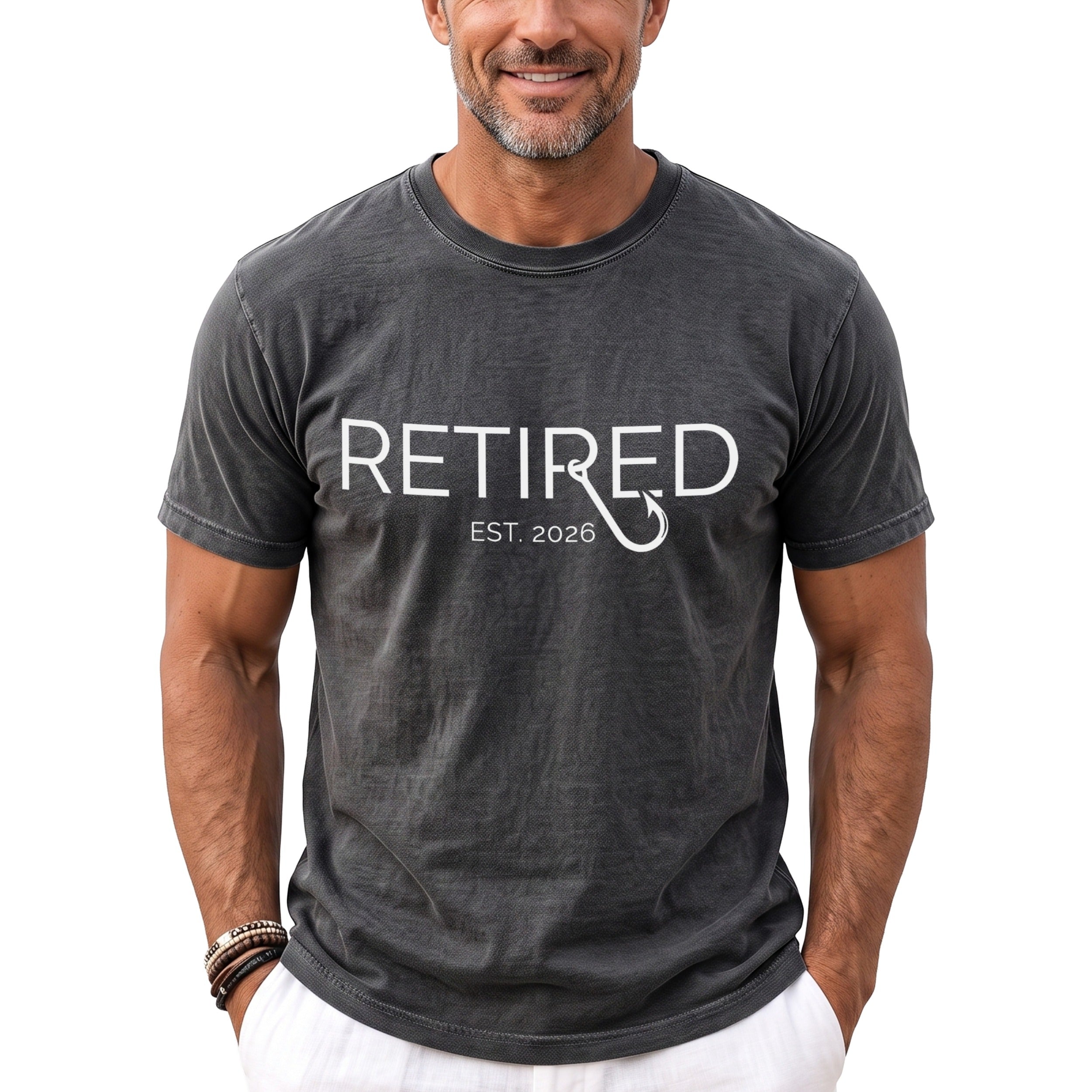 Grey t-shirt with "RETIRED EST. 2026" text and fishing hook graphic.