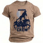 Tan t-shirt with navy blue graphic of a howling wolf above "GROOM CREW" text.