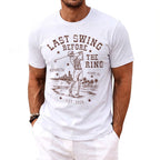 White t-shirt with graphics of a skeleton golfing, "Last Swing Before The Ring," Kenneth, Miami, FL, and Est. 2026.