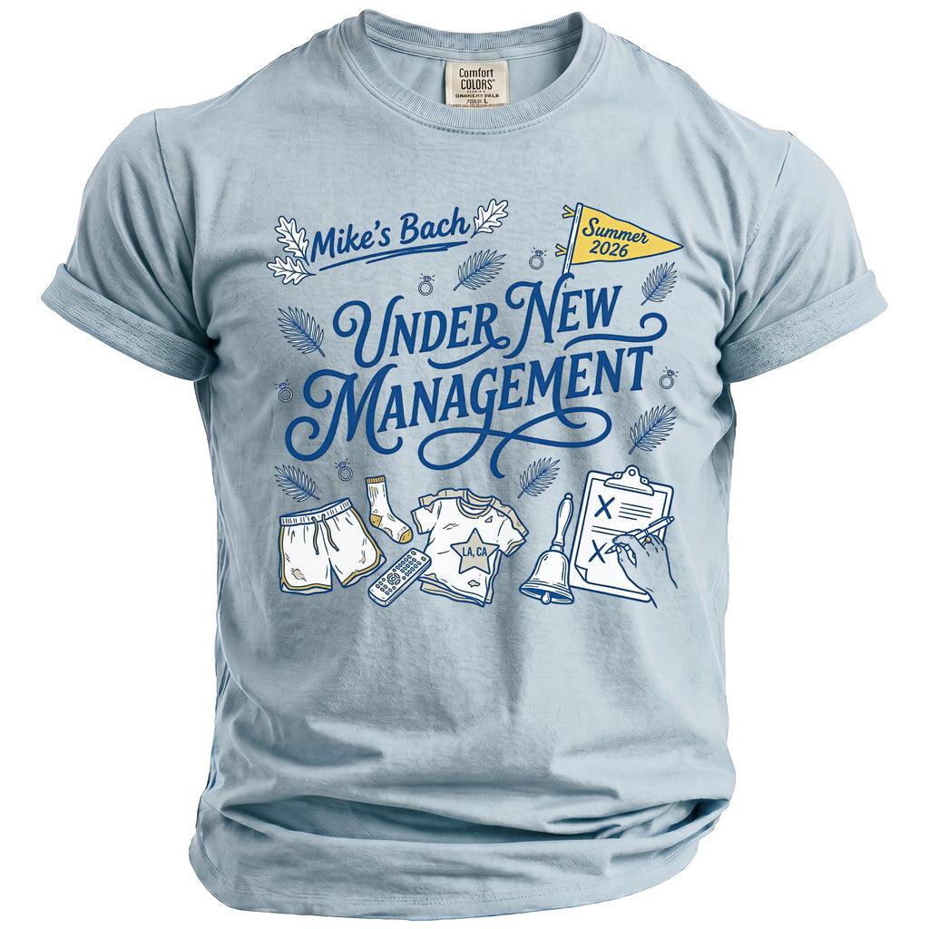 Light blue t-shirt with "Mike's Bach Under New Management Summer 2026" graphic.