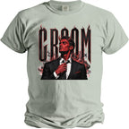 Light green t-shirt with "Groom" text and a devilish man adjusting tie.