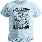 Light blue t-shirt with a dragon golfing, reads "Last Swing Before The Ring Bachelor Golf Weekend".
