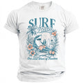 White t-shirt graphic of a shark relaxing with a drink, text "Surf Bach".