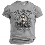 Grey t-shirt with skeleton in suit holding drink; "Til Death Do Us Party Mike's Bach October 2026".