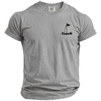 Grey t-shirt with a black golf flag, ball, and grass design on the chest.