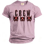 Pink t-shirt with "CREW" text and three red devil masks.