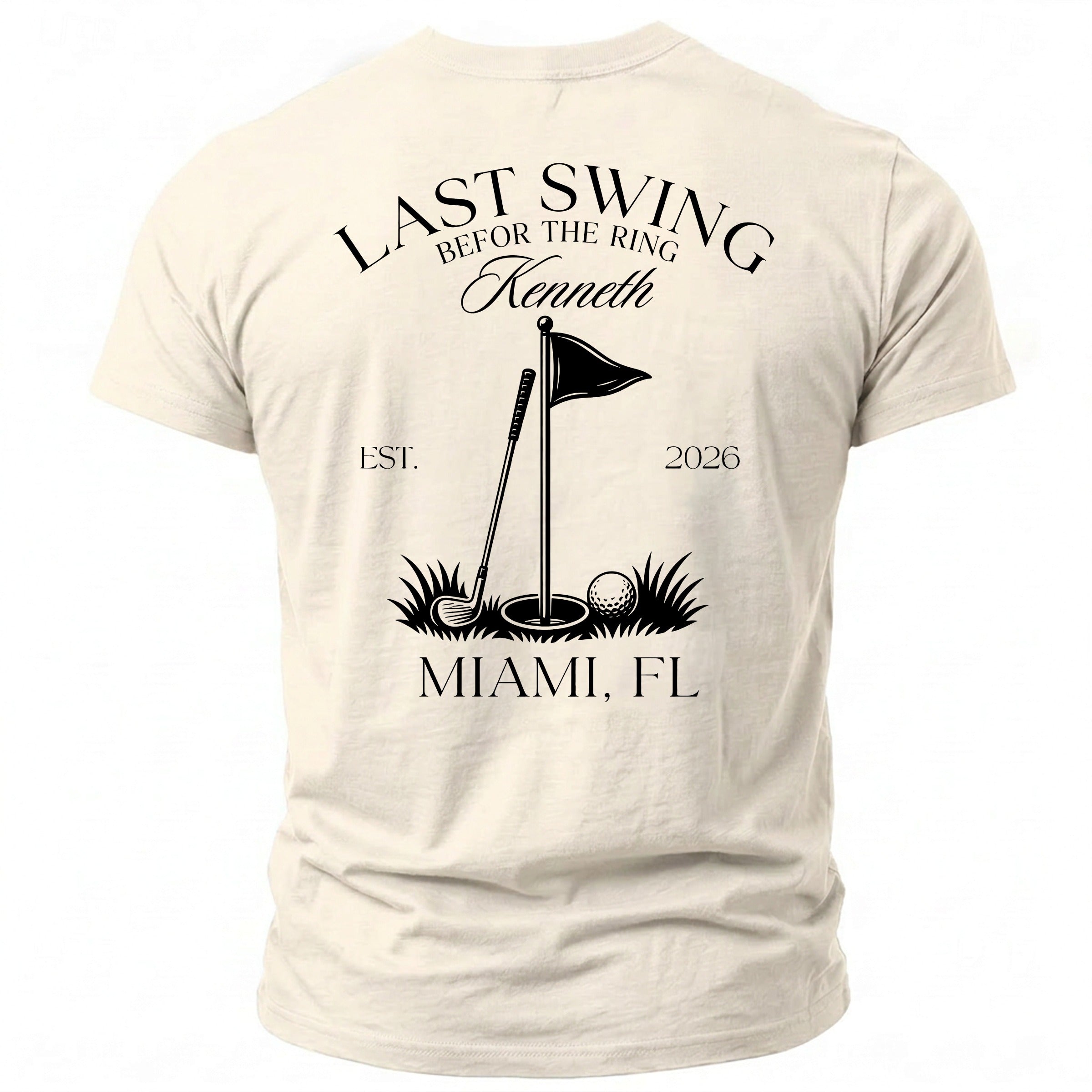 Cream t-shirt with "Last Swing B4 the Ring Kenneth" and golf graphics.