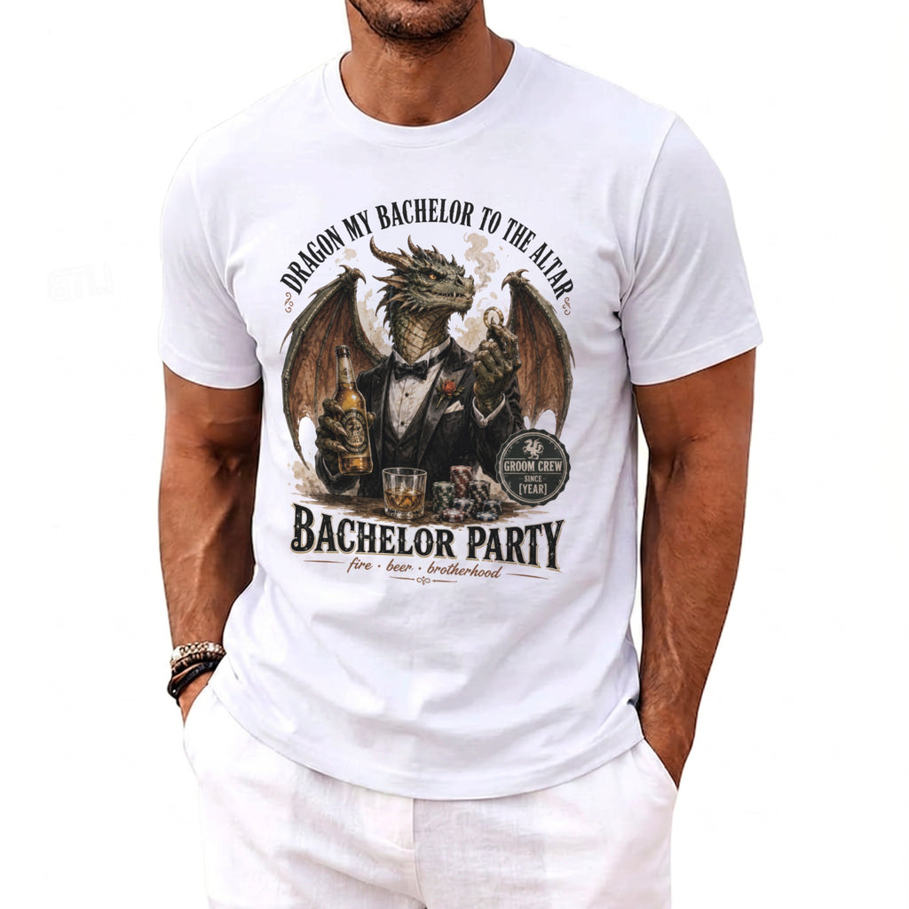 White t-shirt with a dragon holding beer and rings, "Bachelor Party" text.