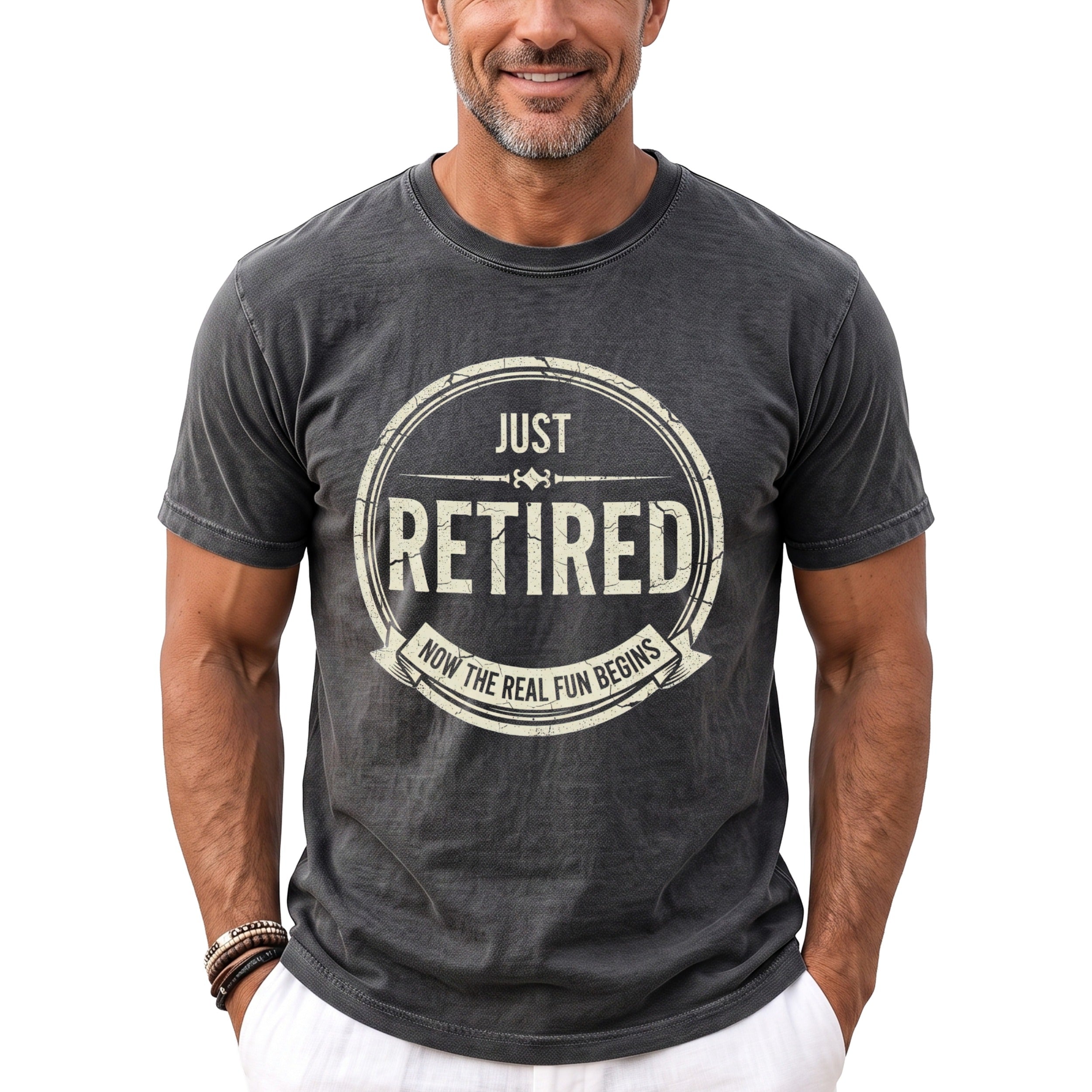 Man in grey t-shirt with "JUST RETIRED NOW THE REAL FUN BEGINS" graphic.