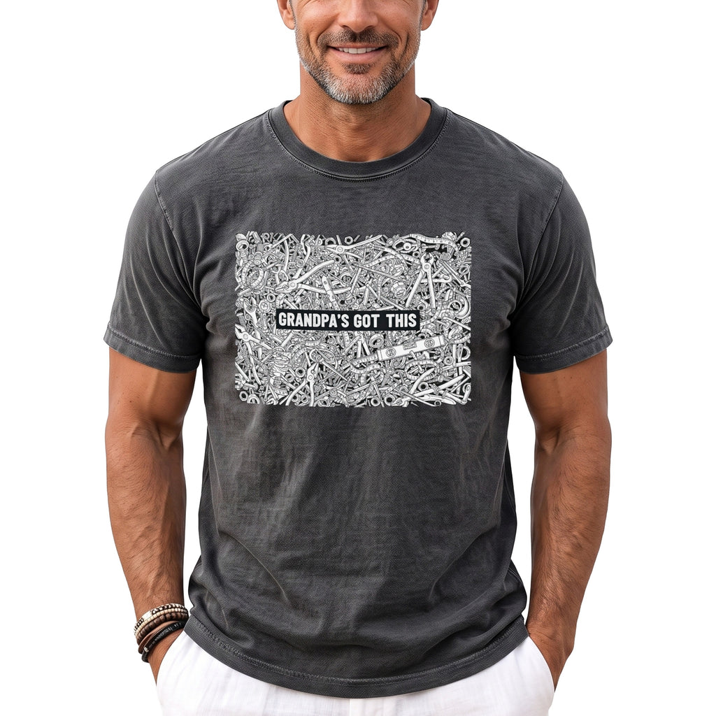 Gray t-shirt with a detailed illustration of tools and the text "GRANDPA'S GOT THIS".