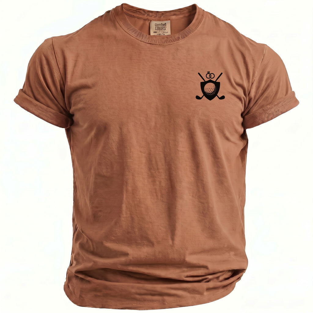 Brown t-shirt with a black golf crest graphic and Comfort Colors tag.