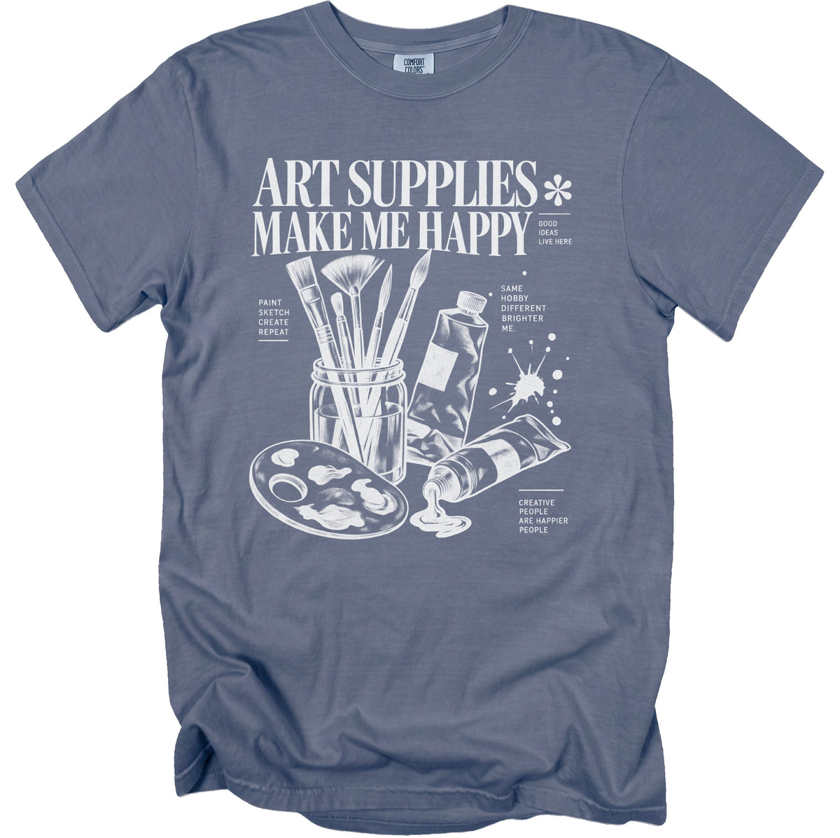 Blue t-shirt with white print: "ART SUPPLIES MAKE ME HAPPY" and art supplies illustration.