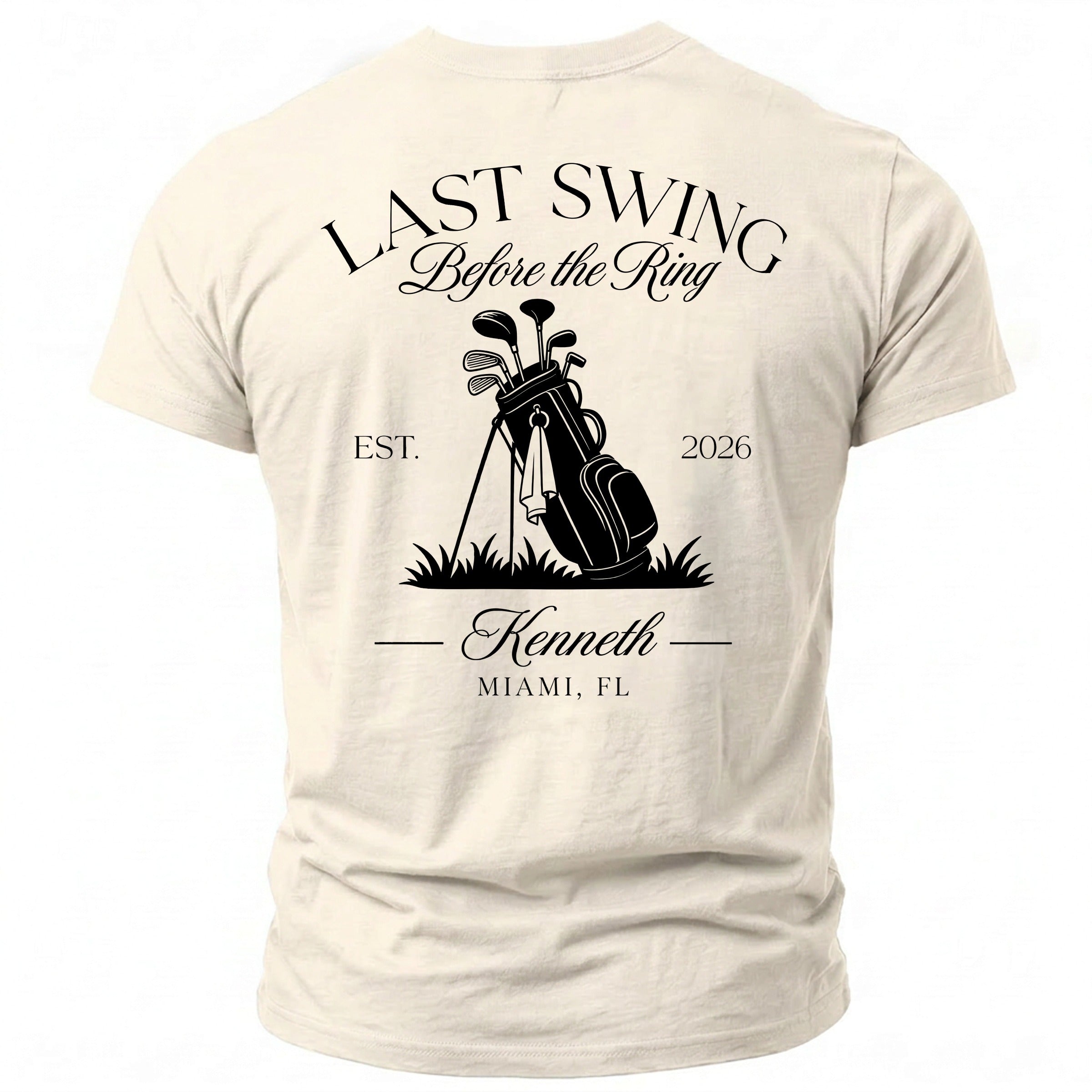 Cream t-shirt featuring "Last Swing Before the Ring," golf bag, and personalization.