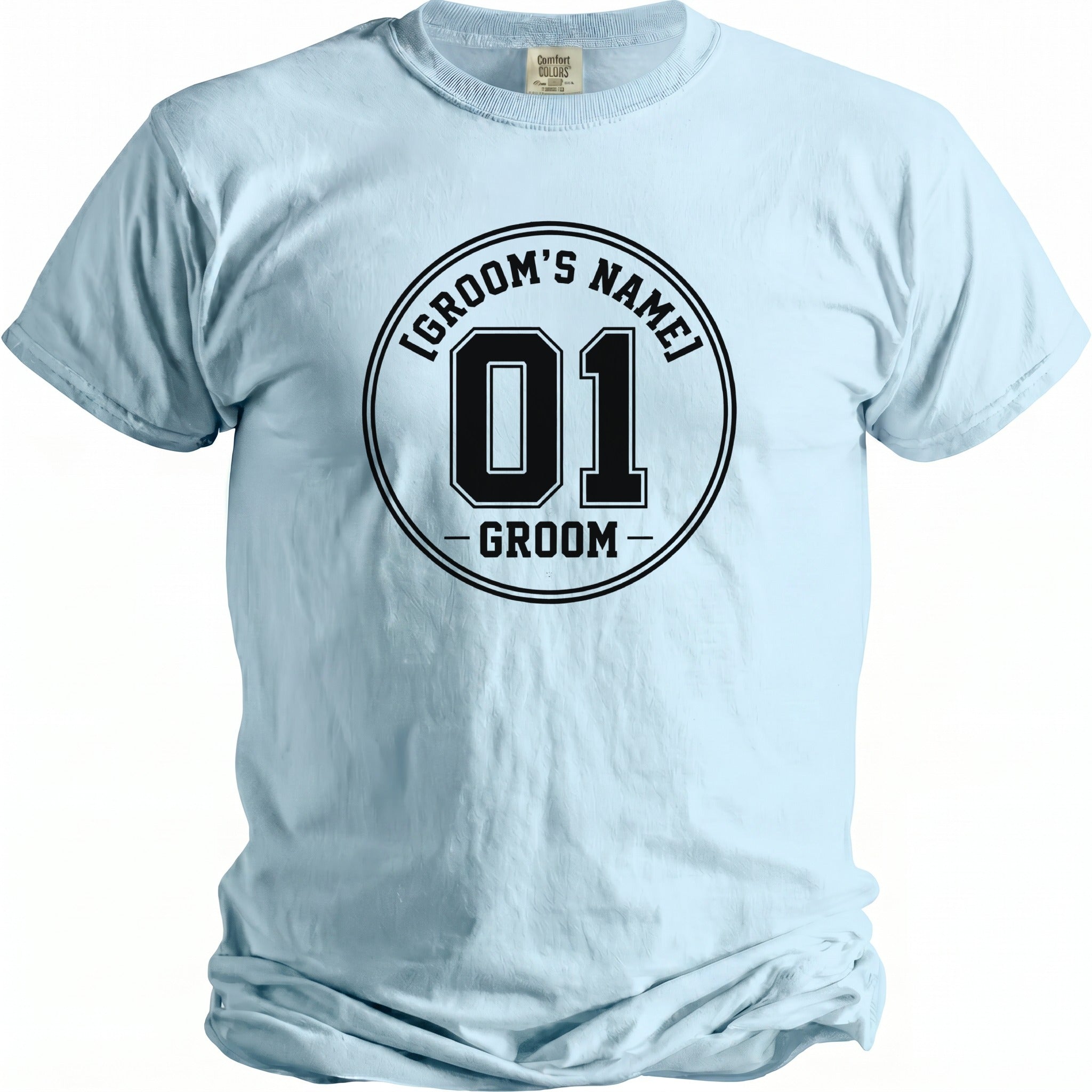 Light blue t-shirt with black circular graphic "[GROOM'S NAME] 01 GROOM".