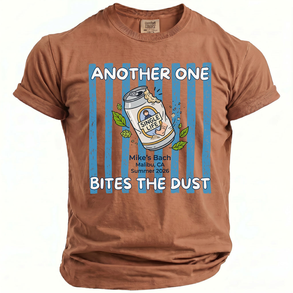 Brown t-shirt with "ANOTHER ONE BITES THE DUST" text and a can graphic.