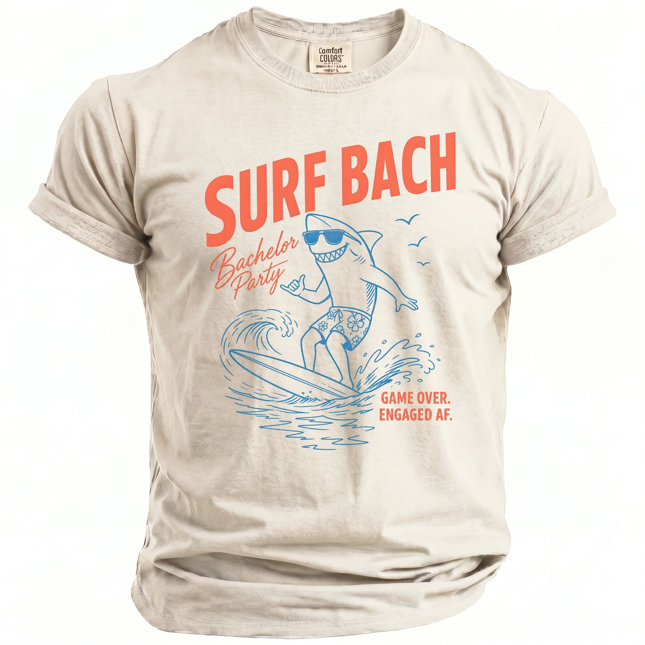 T-shirt with "Surf Bach Bachelor Party" text and shark graphic surfing.