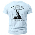 Light blue t-shirt with "KENNETH Last Swing EST. 2026 Be For The Ring Miami, FL" text and golf graphic.