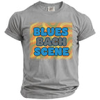 Gray t-shirt with "BLUES BACH SCENE" text in a retro abstract design.