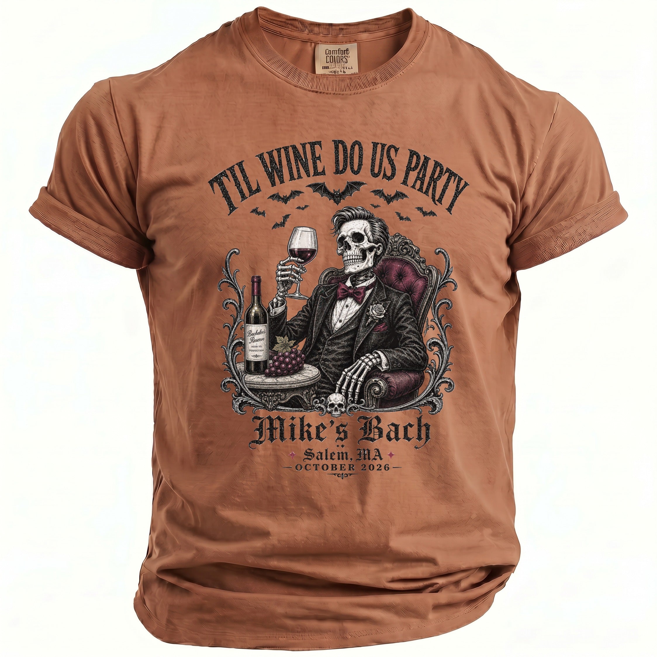 Brown t-shirt with skeleton in tuxedo holding wine, reading "Til Wine Do Us Party".