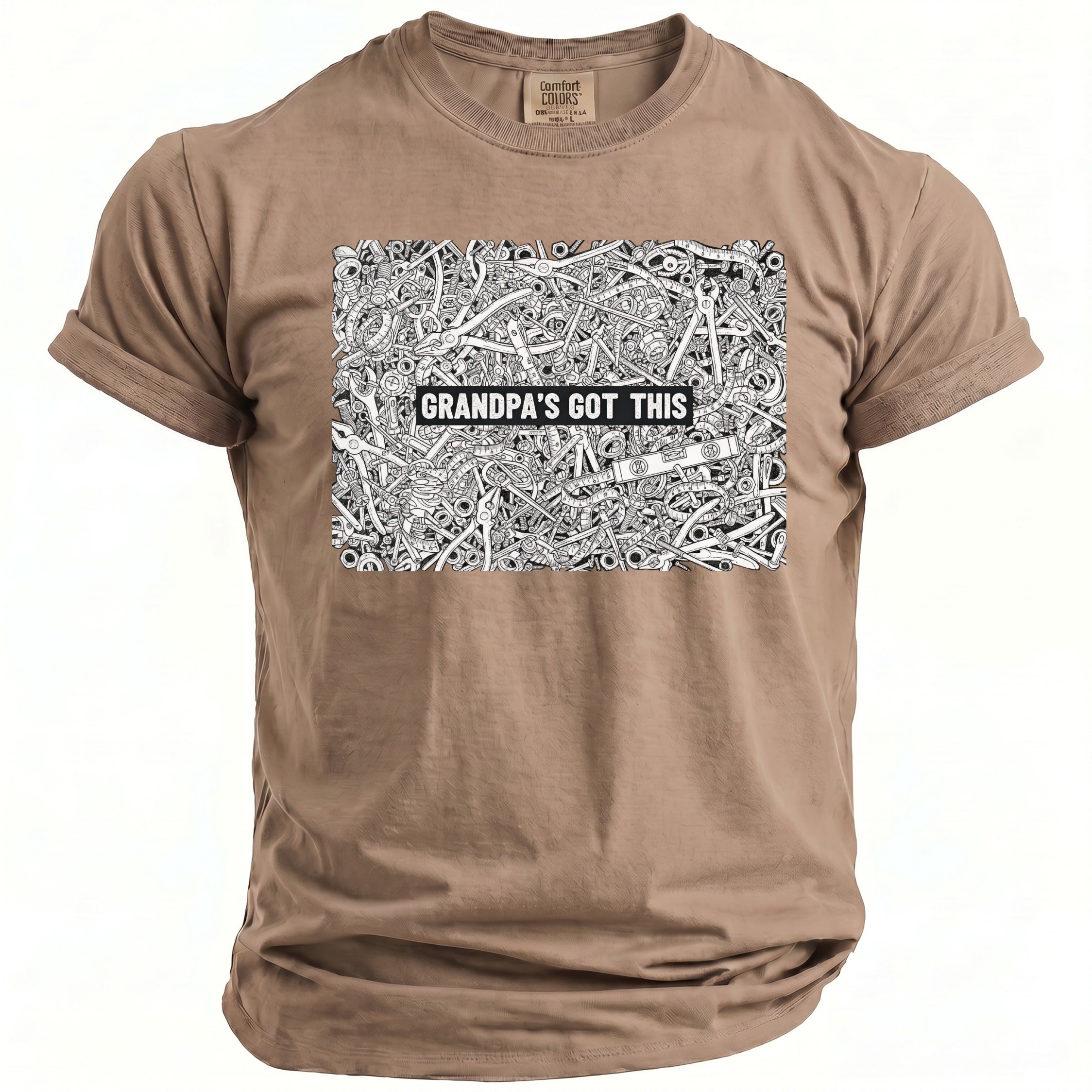 Tan t-shirt with a black and white graphic of tools and the text "GRANDPA'S GOT THIS".