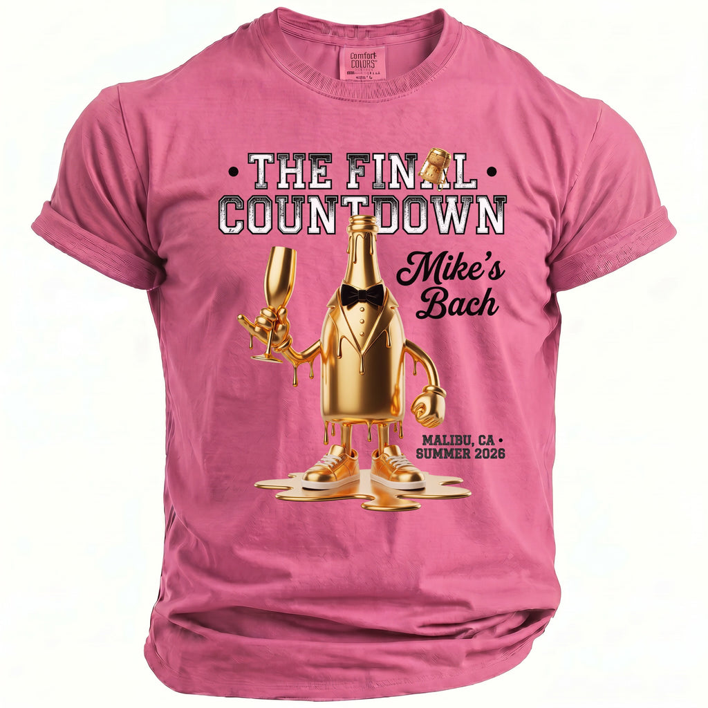 Pink t-shirt with "The Final Countdown" and a gold champagne bottle graphic.