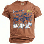 Brown t-shirt with "Mike's Bach Under New Management Summer 2026" graphic.