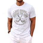 White t-shirt with text "Last Swing Before The Ring Bachelor Weekend 2026" and crossed golf clubs.