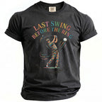 Charcoal t-shirt with "Last Swing Before The Ring" and a golfer.
