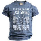 Blue t-shirt with "Last Swing Before the Ring" graphic and golf imagery.