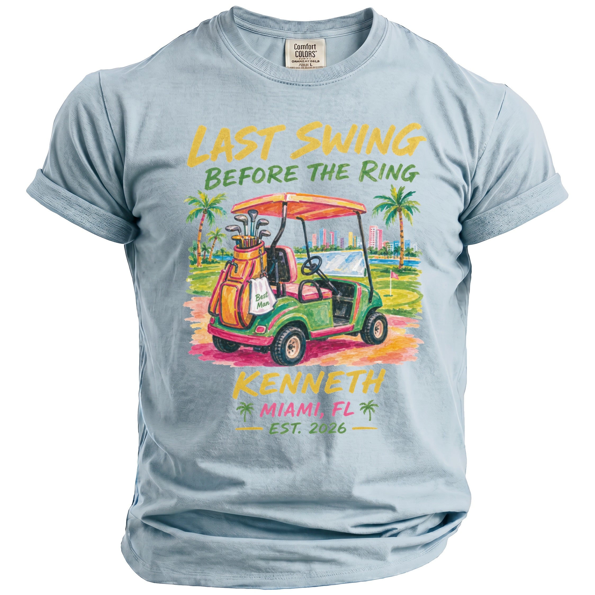 Light blue t-shirt with text "Last Swing Before The Ring" and a golf cart.
