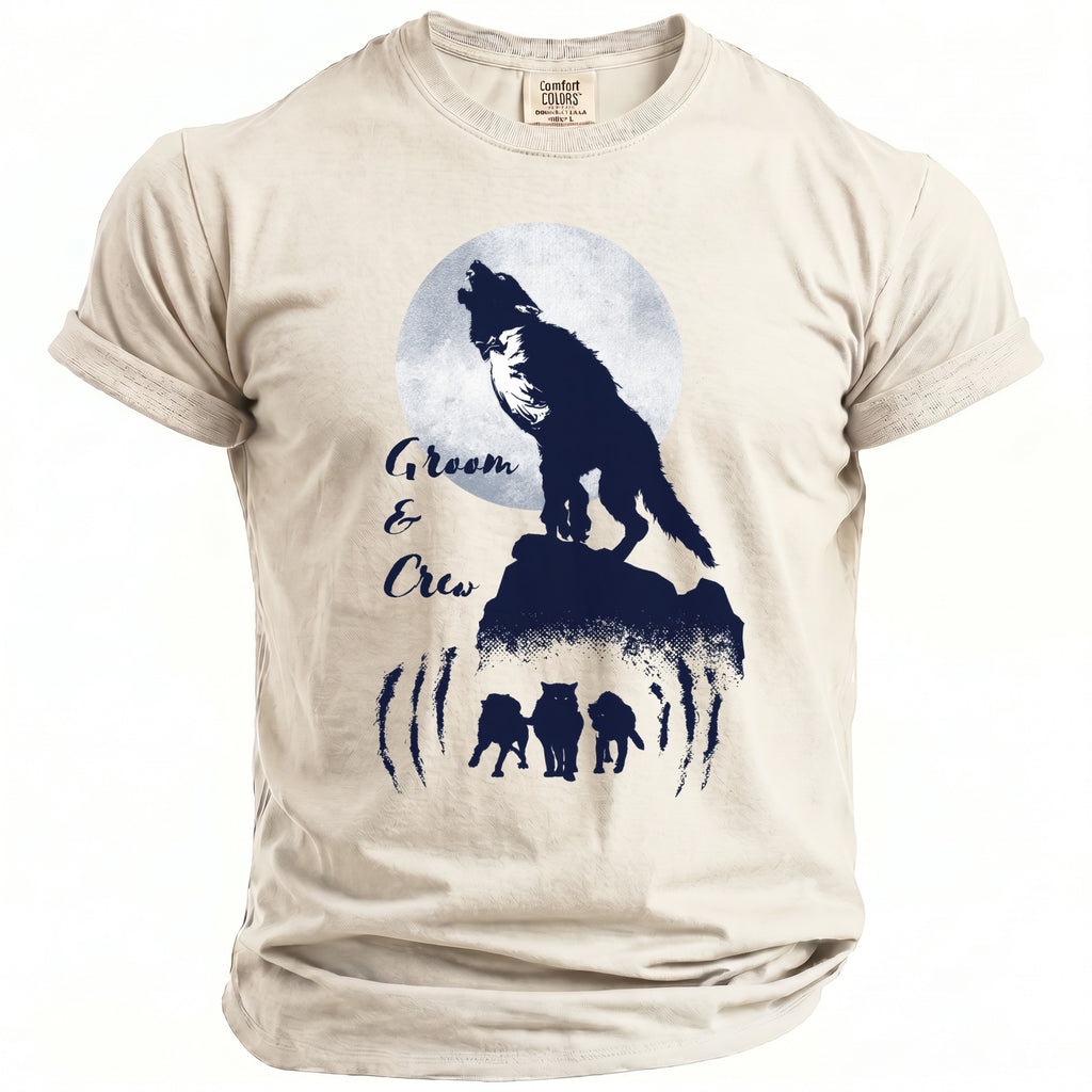 Tan t-shirt with wolf howling at moon and "Groom & Crew" text.