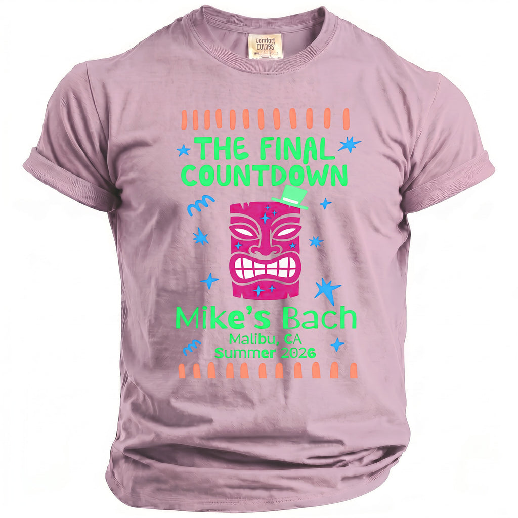 Purple t-shirt with tiki mask graphic saying "The Final Countdown Mike's Bach Malibu, CA Summer 2026".