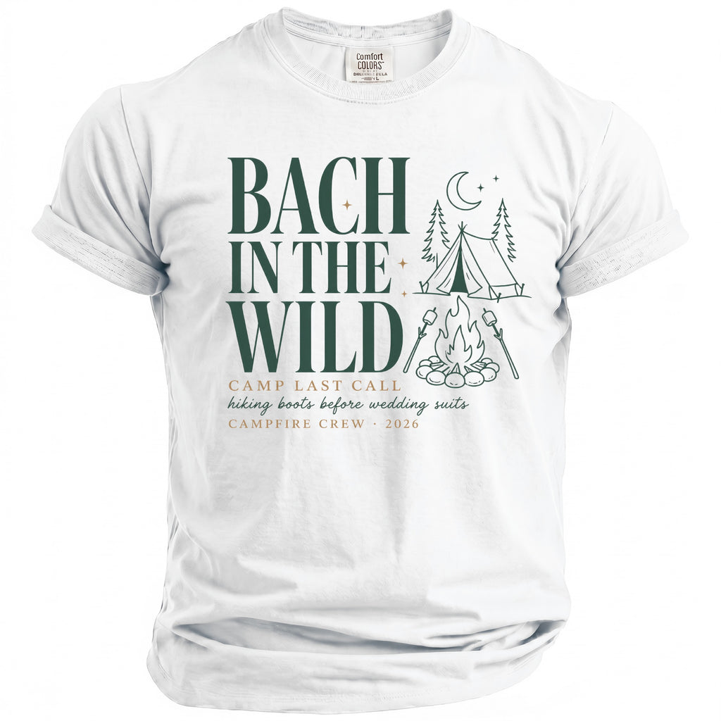 White t-shirt with "Bach in the Wild" text, campfire, tent, and moon graphic.