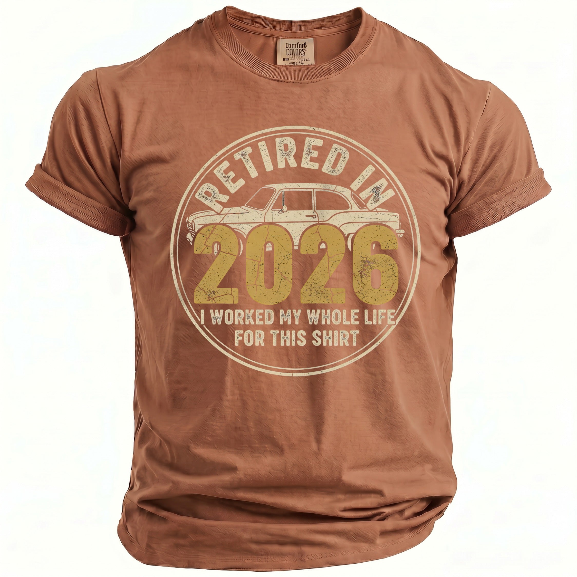 Brown t-shirt with "Retired in 2026 I worked my whole life for this shirt" graphic.