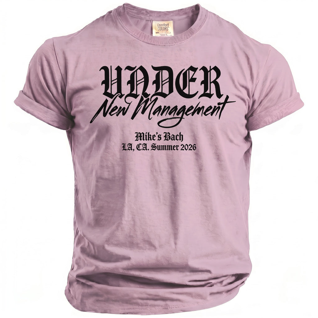 Lavender t-shirt with "UNDER New Management, Mike's Bach, LA, CA Summer 2026" text.