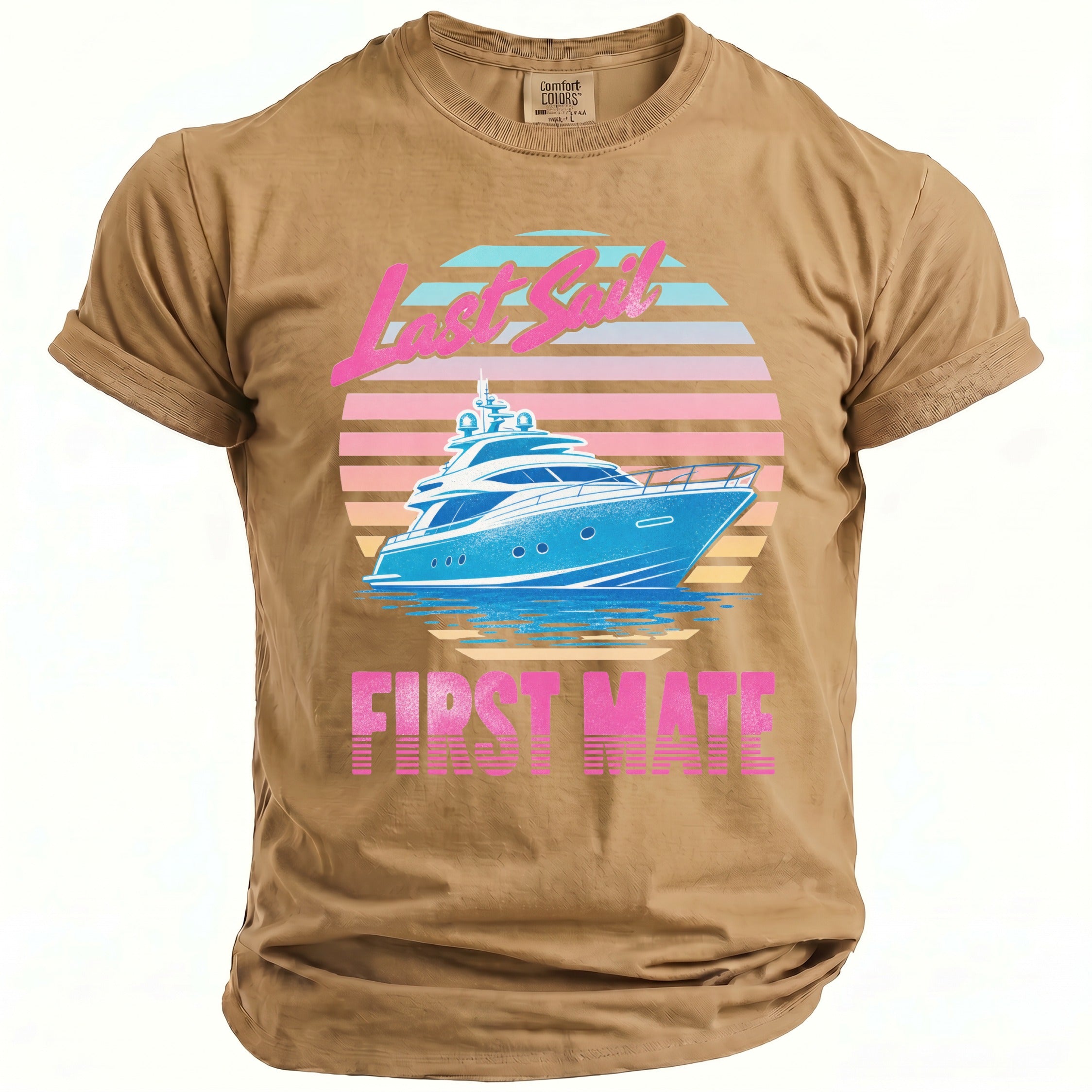 A tan t-shirt with a vintage graphic of a blue yacht, sunset stripes, and text reading Last Sail First Mate.