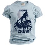 Light blue t-shirt with wolf pack and groom text graphic.