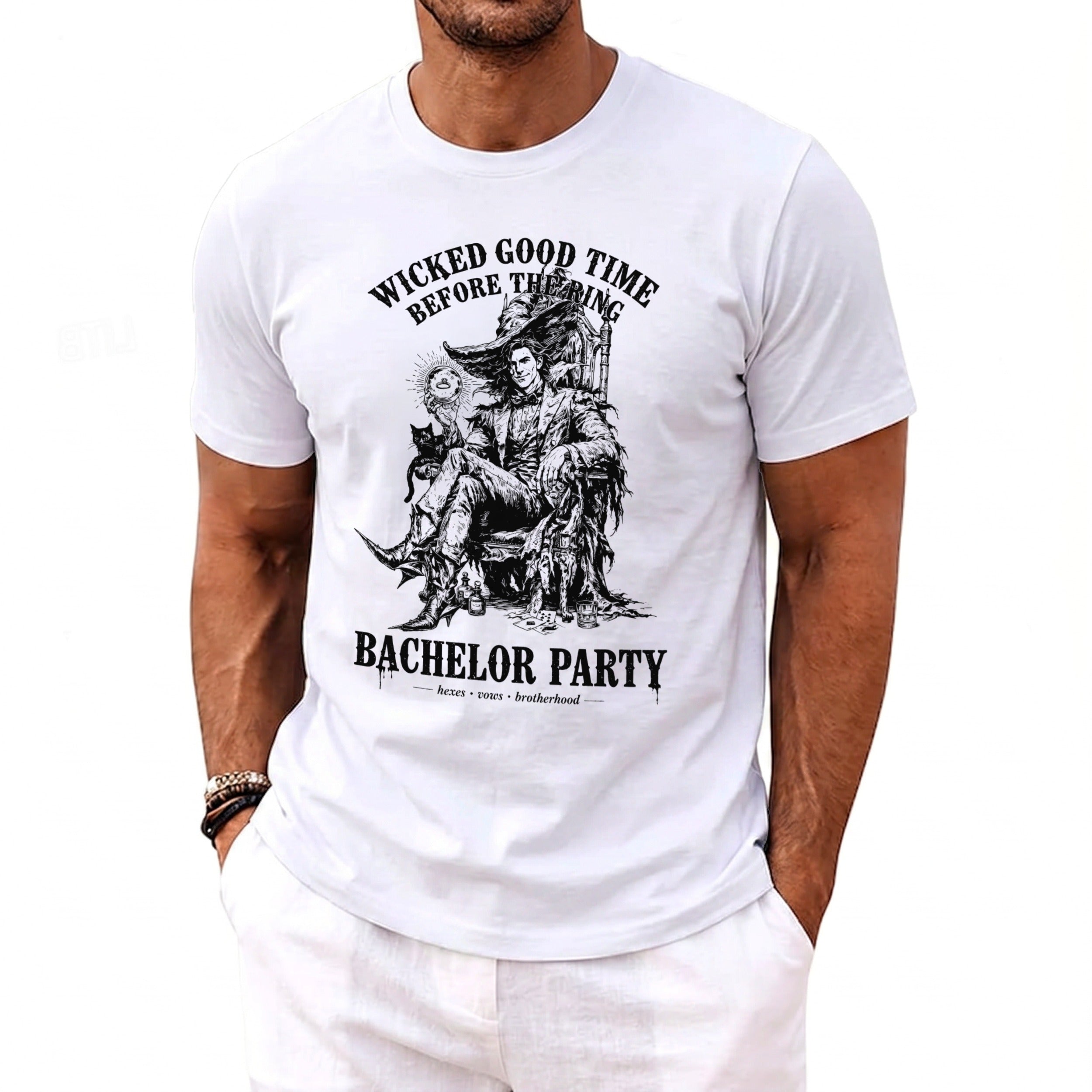 White t-shirt with "WICKED GOOD TIME BEFORE THE RING BACHELOR PARTY" text and graphic.