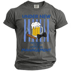 T-shirt with beer, cigar, bow tie, and text "Under New Management".