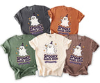 Five t-shirts in various earth tones feature a ghost graphic with "Spooky Booze Crew" and "Tyler's Bachelor Bash" text.