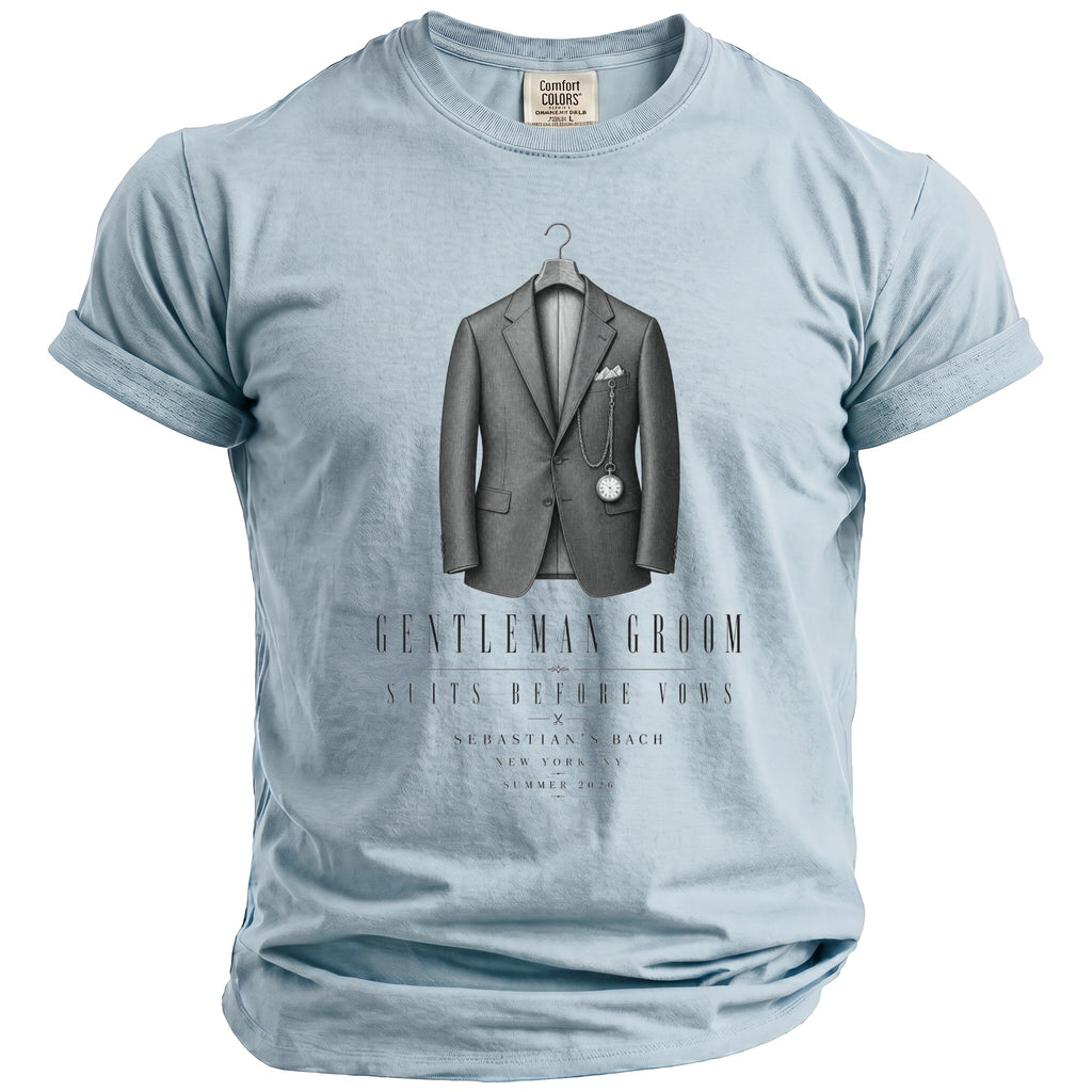 Light blue t-shirt with "Gentleman Groom" graphic, suit, and pocket watch.