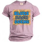 Lavender t-shirt with "BLUES BACH SCENE" graphic in bubble letters.