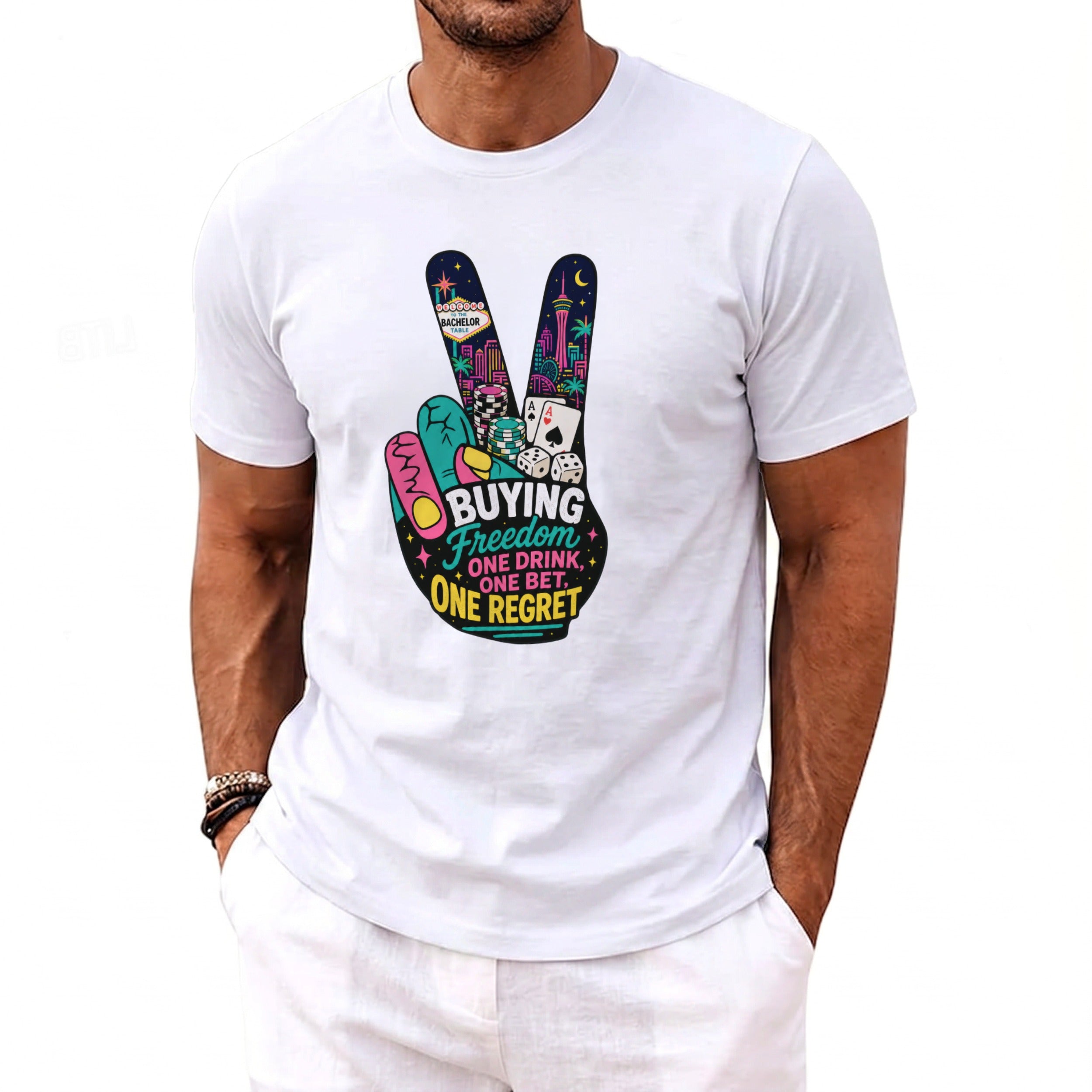 White t-shirt with a colorful peace sign graphic featuring Vegas imagery and text.