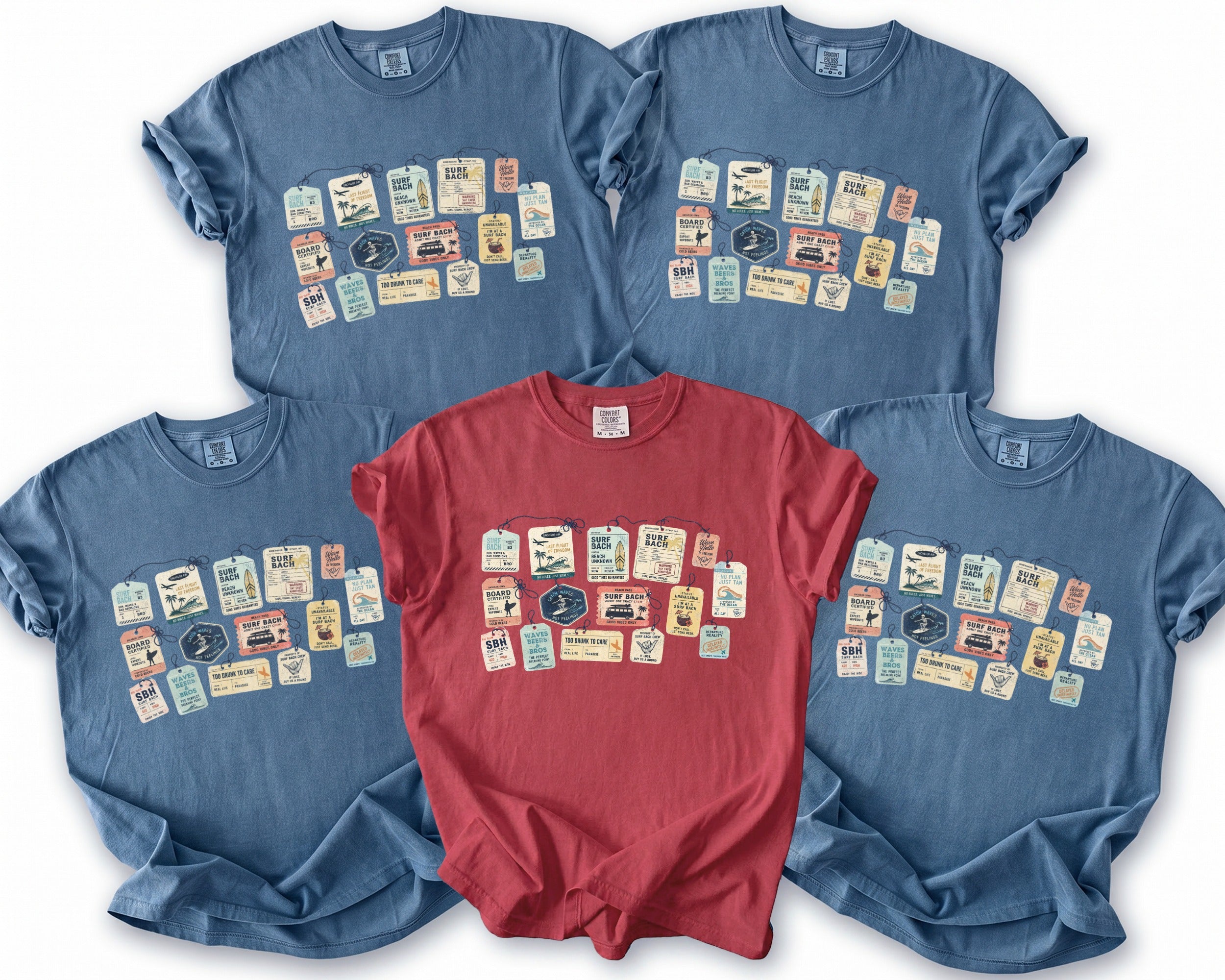 Four blue and one red t-shirt display tags with surf-themed text and graphics.